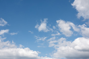 Naklejka na ściany i meble white clouds over blue sky