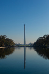 Fototapeta na wymiar Washington DC - December 6, 2015: The Washington Monument can be seen across the reflection pool