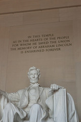 Washington DC - December 6, 2015:  A statue of Abraham Lincoln from inside the Lincoln Memorial - 313865202