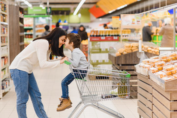 Mother with son at a grocery store