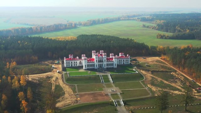 Kosava, Belarus. Aerial Bird's-eye View Of Famous Popular Historic Landmark Kosava Castle. Puslowski Palace Castle. Landmark And Heritage
