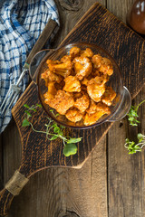 Cauliflower rosettes in a herbal marinade.