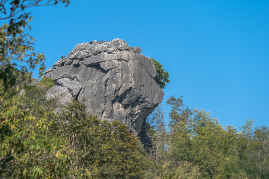 Lion head stone at Doi Samurdow viewpoint is on the high mountain in Nan province north of Thailand,..