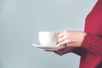 woman hand cup of coffee and tea