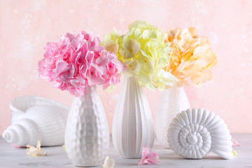 Bouquets of beautiful hydrangea in vases