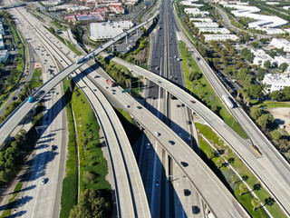 Aerial view of highway transportation with small traffic, highway interchange and junction, San Diego Freeway and Santa Ana Freeway. USU California