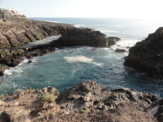 view from a rocky cliff to the sea