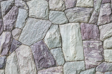 Closeup surface brick pattern at stone brick wall textured background