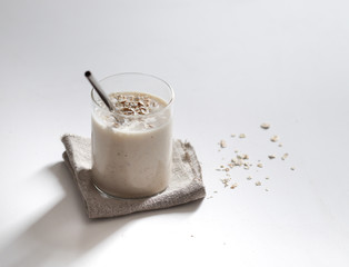 Smoothie with banana and oatmeal, natural energy cocktail