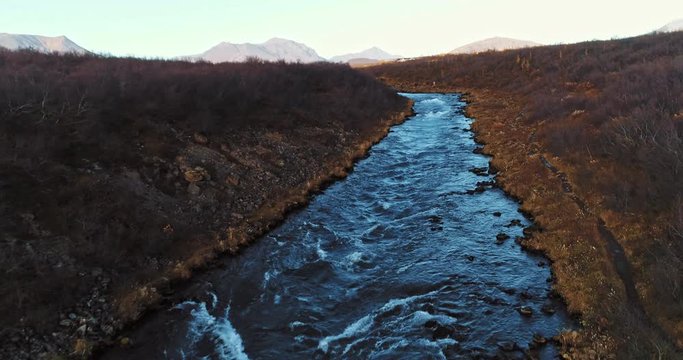 aerial shot of famous Iceland with its beautiful fascinating unique landscape, rivers, mountains, glaciers and waterfalls on a clear sunny day - great 4k shots for nature travel bloggers