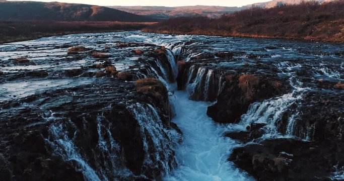 aerial shot of famous Iceland with its beautiful fascinating unique landscape, rivers, mountains, glaciers and waterfalls on a clear sunny day - great 4k shots for nature travel bloggers
