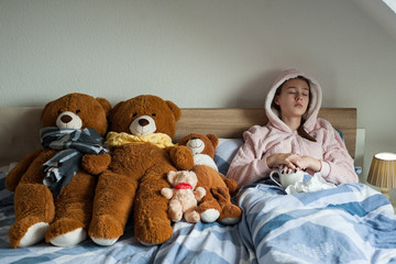 teenager girl with cold symptoms at home