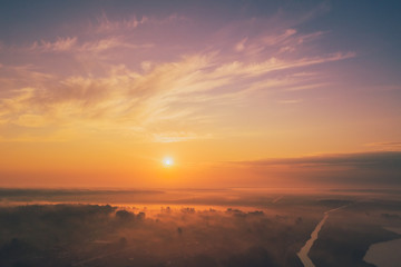 Heavenly morning landscape with fog in the fields. Aerial view