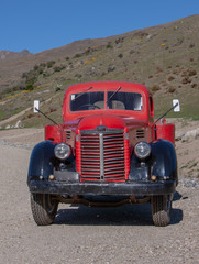 Oldtimer pickup truck. International. Crown Range Road. Highlands. New Zealand South Island.