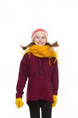 Winter Kids Concepts. Portrait of Active Jumping Positive Caucasian Girl Posing in Winter Outfit Against White in Studio.