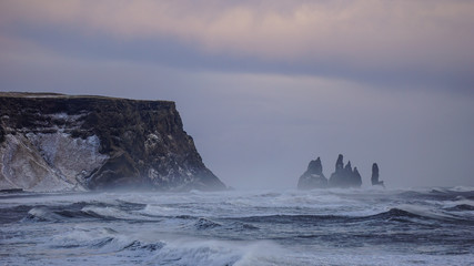 Fototapeta na wymiar Stormy waves of the Atlantic at the Black Sand Beach, South Iceland