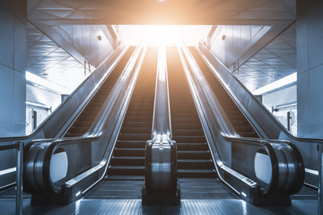 Mechanical escalator in the international airport or modern subway train station