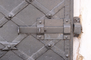 Iron bolt of an old wrought iron door