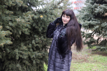portrait of a beautiful brunette girl with long hair