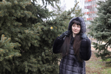 Naklejka premium portrait of a beautiful brunette girl with long hair