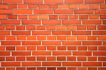 Red color brick wall for brickwork background design . Panorama format