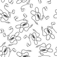 Musical neadphones background. Seamless vector pattern with wired headphones on white. - 313908463