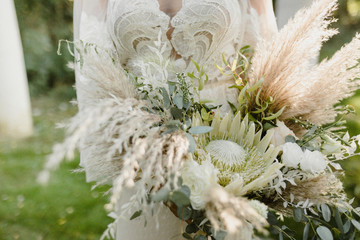 bridal bouquet of flowers wedding day minimalist