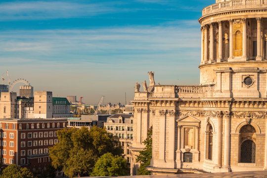 Details of St Pauls Cathedral with London Eye in the background