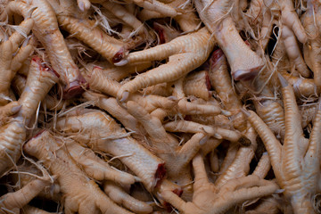 close up chicken feet's feet at a food market 