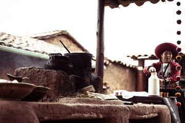 traditional process of colour dye for fabric with clay stove