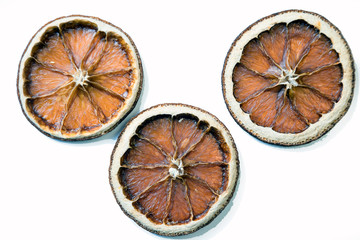 Still life of sliced citrus, orange slices, grapefruit, lemons.