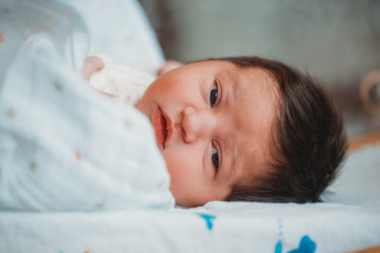 Newborn Baby Girl In Hospital Eyes Wide Open