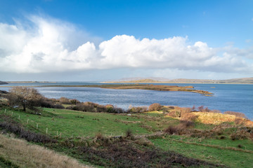 The river Gweebarra is flowing into the Atlantic by Lettermacaward in County Donegal - Ireland