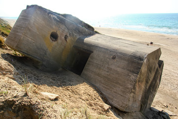 The German Nazi bunker and fortresses from the Second world war are standing on the beaches 