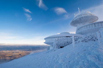 peak of Sniezka mountain in Giant Mountains in Poland and Czech republic border during winter