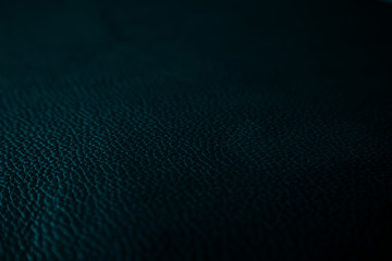 Texture cuir bleu vert très foncé grainé et plié