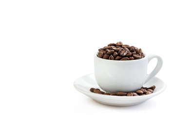 White coffee cup on saucer and roasted beans isolated on white background. Full depth of field . Close up.