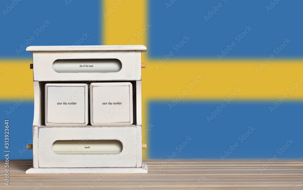 Poster wooden retro calendar with free space for a date on the background of the flag of sweden. template f