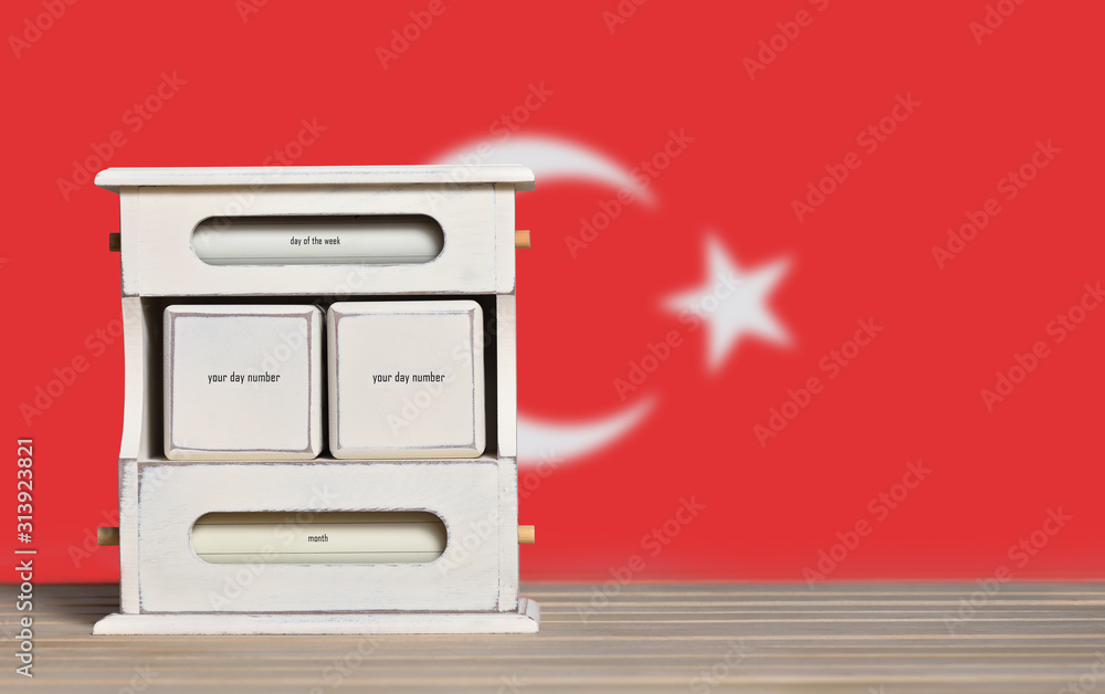 Poster wooden retro calendar with free space for a date on the background of the flag of turkey. template f