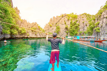 Boat trip at sunset to the famous "Twin Lagoon" on Coron Island, Palawan, Philippines