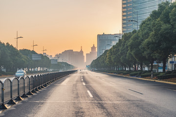 Long morning street in Shanghai city in the morning.