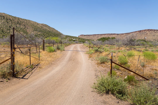 Gravel road departing from the legendary Route 66, Arizona, USA.