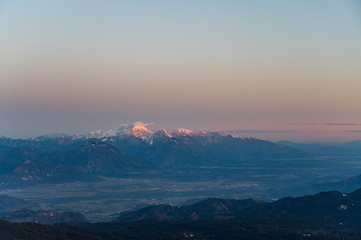 Spectacular winter mountain panoramic view of mountains at sunset.