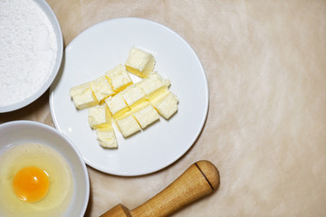 Ingredients for baking cake - flour, egg, butter.