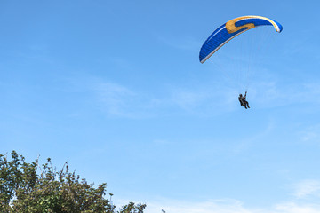 Paragliders over Longues-sur-Mer, Normandy