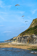 Paragliders in Normandy