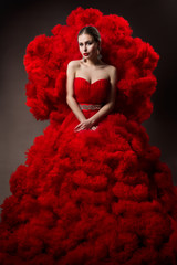 Fashion Model art Red Dress, Woman Beauty portrait, Beautiful Queen in Waves Cloth Gown