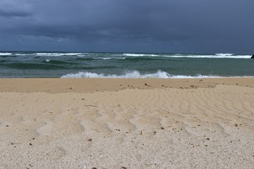 Textures and lines in the sand in beach landscape