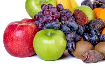 assortment or tropical fruits isolated on white background