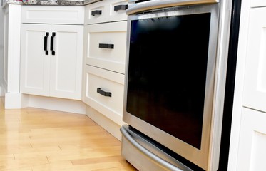 Obraz premium White contemporary kitchen cabinets and drawers 